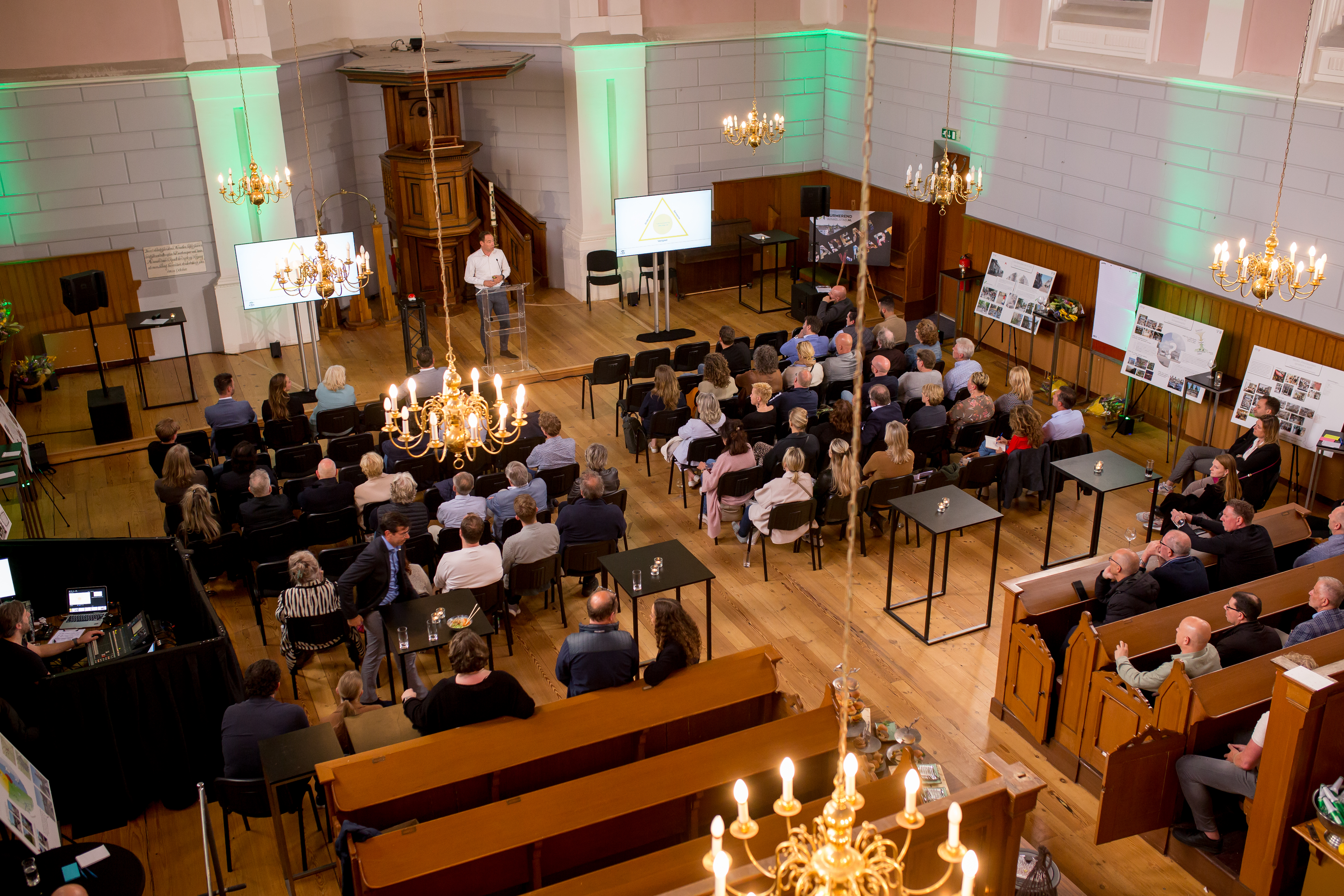 Foto van de bijeenkomst in de Lutherse Kerk van 21 april 2022 over de toekomst van de binnenstad